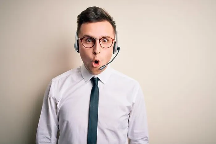 Framed Print : Young handsome caucasian business man wearing call center headset at customer service afraid Framed Print : Young handsome caucasian business man wearing call center headset at customer service afraid