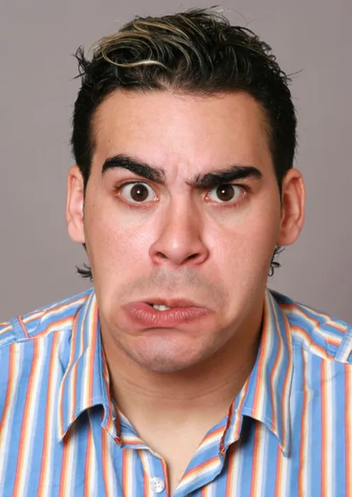 Framed Print : young man with a funny face