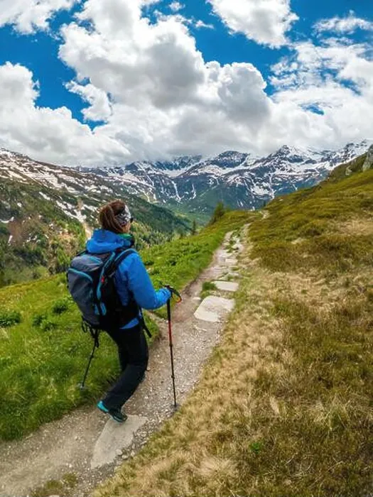 Framed Print : Young woman hiking on footpath in the Austrian Alps near Gastein, Salzburg, Austria Framed Print : Young woman hiking on footpath in the Austrian Alps near Gastein, Salzburg, Austria