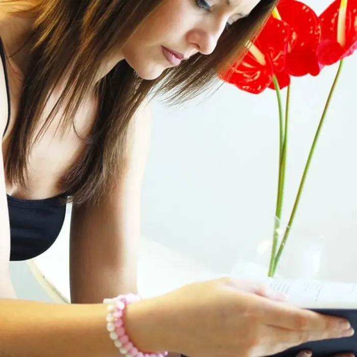 Framed Print : Young Woman Reading a book Framed Print : Young Woman Reading a book