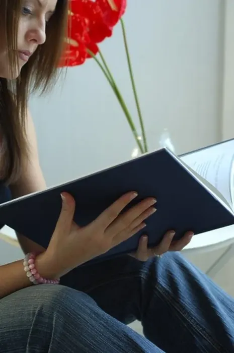 Framed Print : Young Woman Reading a book Framed Print : Young Woman Reading a book