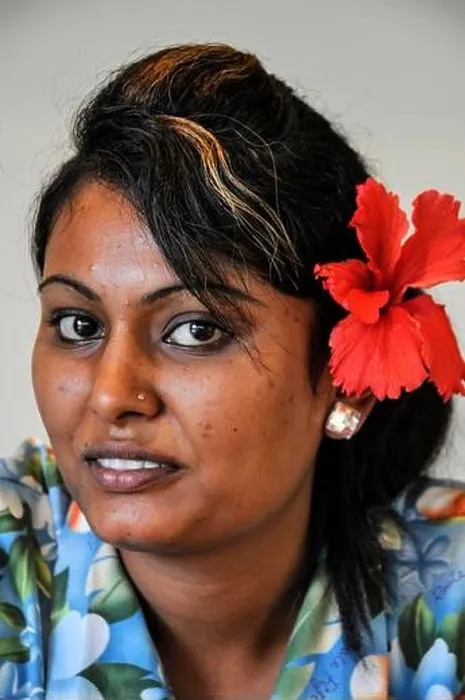 Framed Print : A young woman wearing a Red Hibiscus - a native flower of Fiji in the South Pacific Half of Fiji's population are of Asian decent Framed Print : A young woman wearing a Red Hibiscus - a native flower of Fiji in the South Pacific Half of Fiji's population are of Asian decent