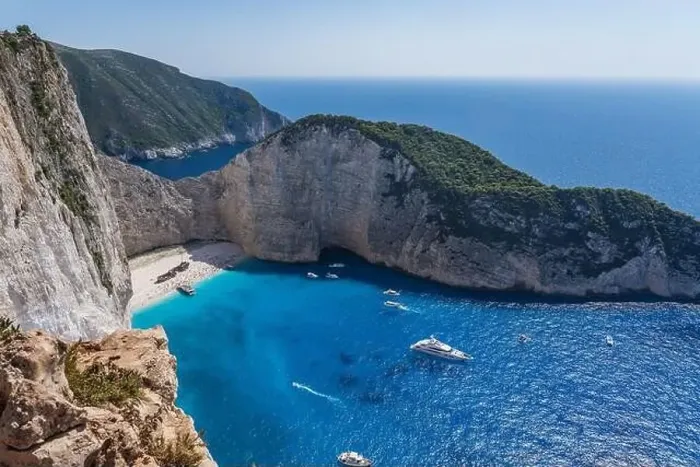 Framed Print : Zakynthos Shipwreck Navagio beach cove with luxury yachts view from cliff observation view point Framed Print : Zakynthos Shipwreck Navagio beach cove with luxury yachts view from cliff observation view point