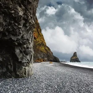 Basalt rock formations Troll toes on black beach near Reynisdrangar, Vik, Iceland. Landscape photography