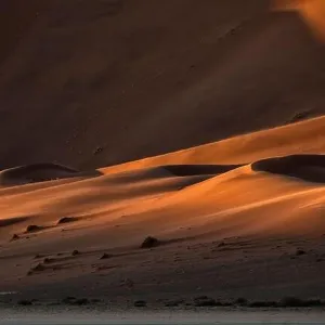 Contrasted abstract of the Oxide rich red sand dunes in the great sand sea of Namibia Contrasted abstract of the Oxide rich red sand dunes in the great sand sea of Namibia