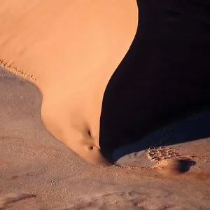 Contrasted abstract of the Oxide rich red sand dunes in the great sand sea of Namibia Contrasted abstract of the Oxide rich red sand dunes in the great sand sea of Namibia