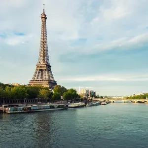 Eiffel tower in Paris from the river Seine in spring season. Paris, France Eiffel tower in Paris from the river Seine in spring season. Paris, France