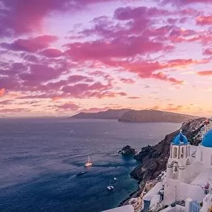 Fantastic sunset landscape of famous travel and vacation destination. Luxury summer adventure concept. Wonderful view of Oia village, Santorini Greece