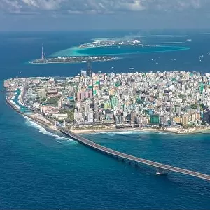 Island Of Male, The Capital of Maldives from the sky. Bridge connecting with the airport island. Maldives island, cityscape, exotic travel destination