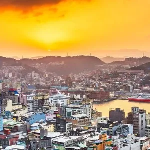 Keelung, Taiwan downtown city skyline on the bay at dusk