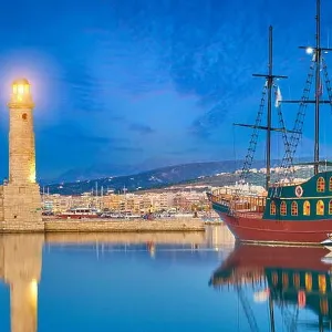 Lighthouse at Old Venetian Port, Rethymno, Crete Island, Greece Lighthouse at Old Venetian Port, Rethymno, Crete Island, Greece