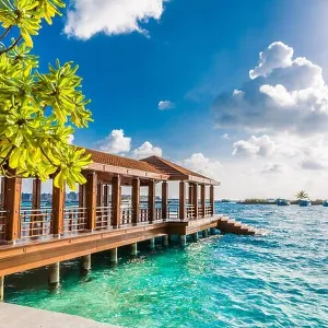 Maldives dock and airport area for tourists in a sunny day. Luxury dock or port in Maldives with mangrove with azure lagoon Maldives dock and airport area for tourists in a sunny day. Luxury dock or port in Maldives with mangrove with azure lagoon