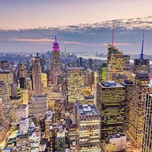 New York City, USA midtown Manhattan financial district cityscape at dusk