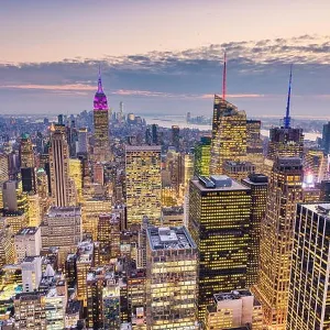 New York City, USA midtown Manhattan financial district cityscape at dusk