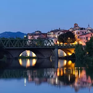 Old city reflection in Tevere river, Umbertide, Italy