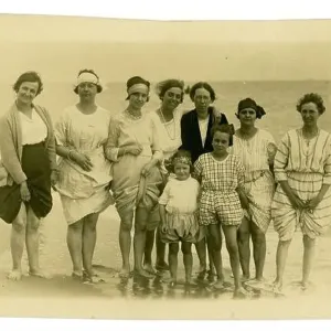 Original very clear 1920's era postcard of fashionable bathers, attractive women and girls, fashionable headbands and hairstyles