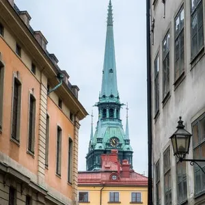 Stockholm old town alley, Sweden. Gamlastan: Stockholm old town. Colourful narrow street. Sweden Stockholm old town alley, Sweden. Gamlastan: Stockholm old town. Colourful narrow street. Sweden