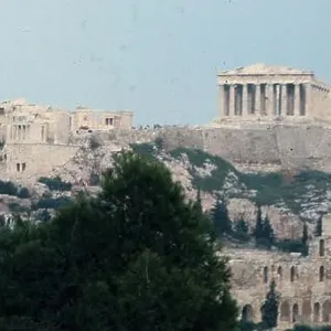 Vintage travel photo of the Acropolis overlooking Athens Greece, taken in October 1973