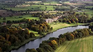 Derbyshire Prints: 09/10/12. An aerial view showing autumn colour framing the historic 17th century Sudbury Hall near