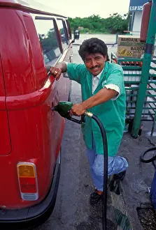 Mesoamerica Prints: 1 one Mexican man, pumping gas
