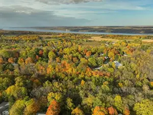 10-16-2022, Late afternoon aerial autumn image of the area surrounding the Village of Trumansburg, NY, USA