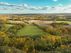 10-16-2022, Late afternoon aerial autumn image of the area surrounding the Village of Trumansburg, NY, USA