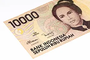 Wealthy Prints: 10000 rupiah bank note. Rupiah is the national currency of Indonesia