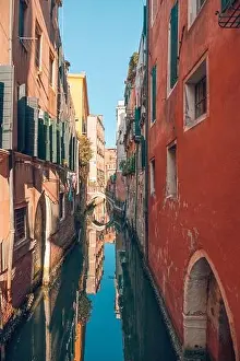 10.09.19 - Traditional canal street with gondola in Venice, Italy. Italy beauty, one of canal streets in, Venezia. Old canal with boats and bridge