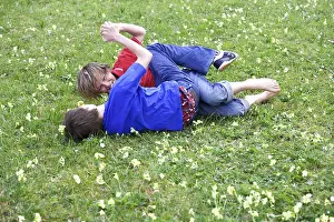 11-13 years fight meadow boys people children two childhood friends enemies dispute wrangling fight rolls full-length