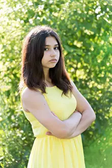 14 year old girl with crossed arms on chest