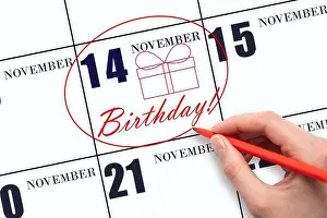 Today Prints: 14th day of November. The hand circles the date on the calendar 14 November