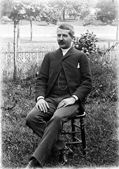 Hars Prints: 1890s 1900s PORTRAIT MAN WEARING THREE PIECE SUIT SITTING IN CHAIR IN GARDEN