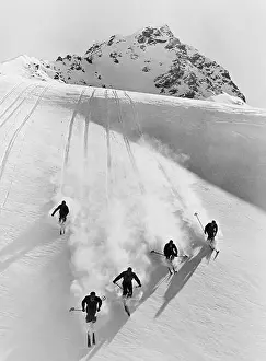 Physical Fitness Prints: 1920s 1930s FIVE MEN SKIING DOWN SNOW COVERED ALPS SWITZERLAND