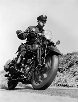 Mature Prints: 1930s BLURRED ACTION SHOT OF MOTORCYCLE POLICEMAN DRIVING FAST BLOWING WHISTLE