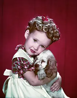Hars Prints: 1940s PORTRAIT GIRL WEARING PLAID DRESS HUGGING COCKER SPANIEL PUPPY