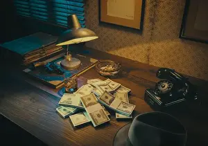 Mafia Prints: 1950s film noir style desktop with revolver and cash money: crime