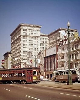 Wish You Were Here Collection: 1960s 1970s TROLLEY STREETCAR TURNING FROM CARONDELET AND PUBLIC TRANSPORTATION BUS ON CANAL