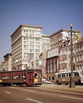 Motor Vehicle Prints: 1960s 1970s TROLLEY STREETCAR TURNING FROM CARONDELET AND PUBLIC TRANSPORTATION BUS ON CANAL STREET NEW ORLEANS