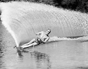 Hars Prints: 1970s MAN SLALOM WATER SKIING LEANING TO SIDE TO CREATE WALL OF WATER BEHIND