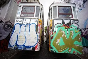 Glory Prints: 2 carriages stopped in parallel belonging to the glory elevator in Lisbon- Portugal