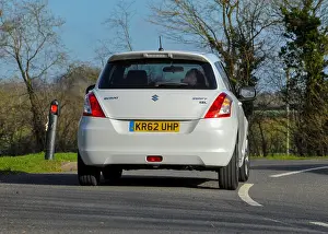 Reliable Prints: 2013 Suzuki Swift SZ-L compact car