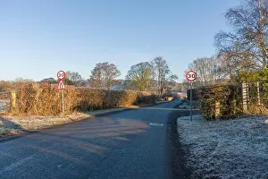 Somerset Prints: 30mph speed limit signs on Half Yard lane on the outskirts of the village of Wrington in winter