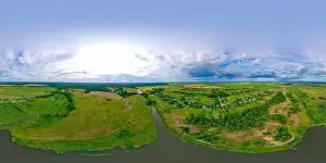 Blue River Prints: 360-degree aerial view from a drone of a large river and green meadows