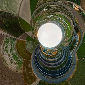 360 view from the air to the entrance to Port Saplaya Bay and agrarian fields around during a bright sunset. Valencia