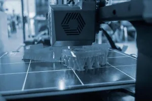 Process Prints: 3D printer printing object close-up