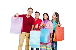 Creative Ideas Prints: 4 indian family Parents young daughter and son Shopping
