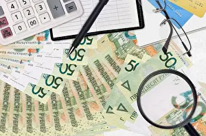 Credit Card Prints: 50 Belorussian rubles bills and calculator with glasses and pen