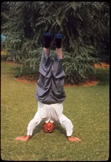 Southern California Prints: 79-year-old Donnell M Spencer standing on this head in 1968 in Southern California birthday male man retired retirement