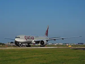 Taxiing Prints: A7-BFE is a Boeing 777-FDZ cargo aircraft operated by Qatar Airways