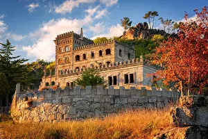 Sortelha Prints: Abandoned ruin building of Termas Radium Hotel Serra da Pena in Sortelha with beautoful colorful trees at sunset